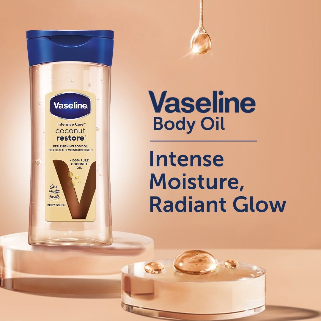 Huile corporelle Vaseline Intensive Care Coconut Restore pour une peau saine et hydratée. Gel-huile corporel régénérant à base d'huile de noix de coco 100 % pure,