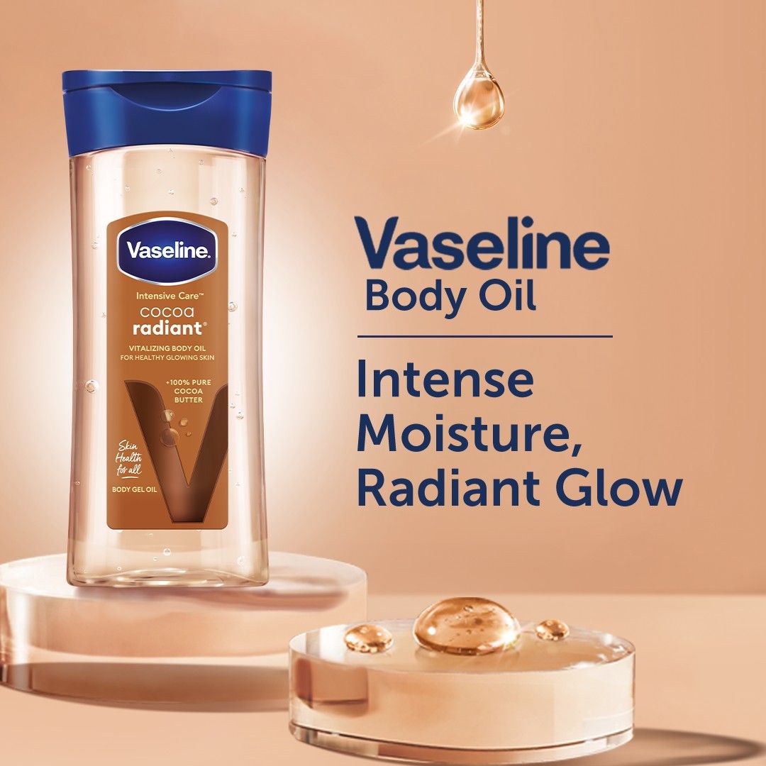 Vaseline Intensive Care Cocoa Radiant pour une peau éclatante, huile corporelle au beurre de cacao pur + huiles régénérantes,