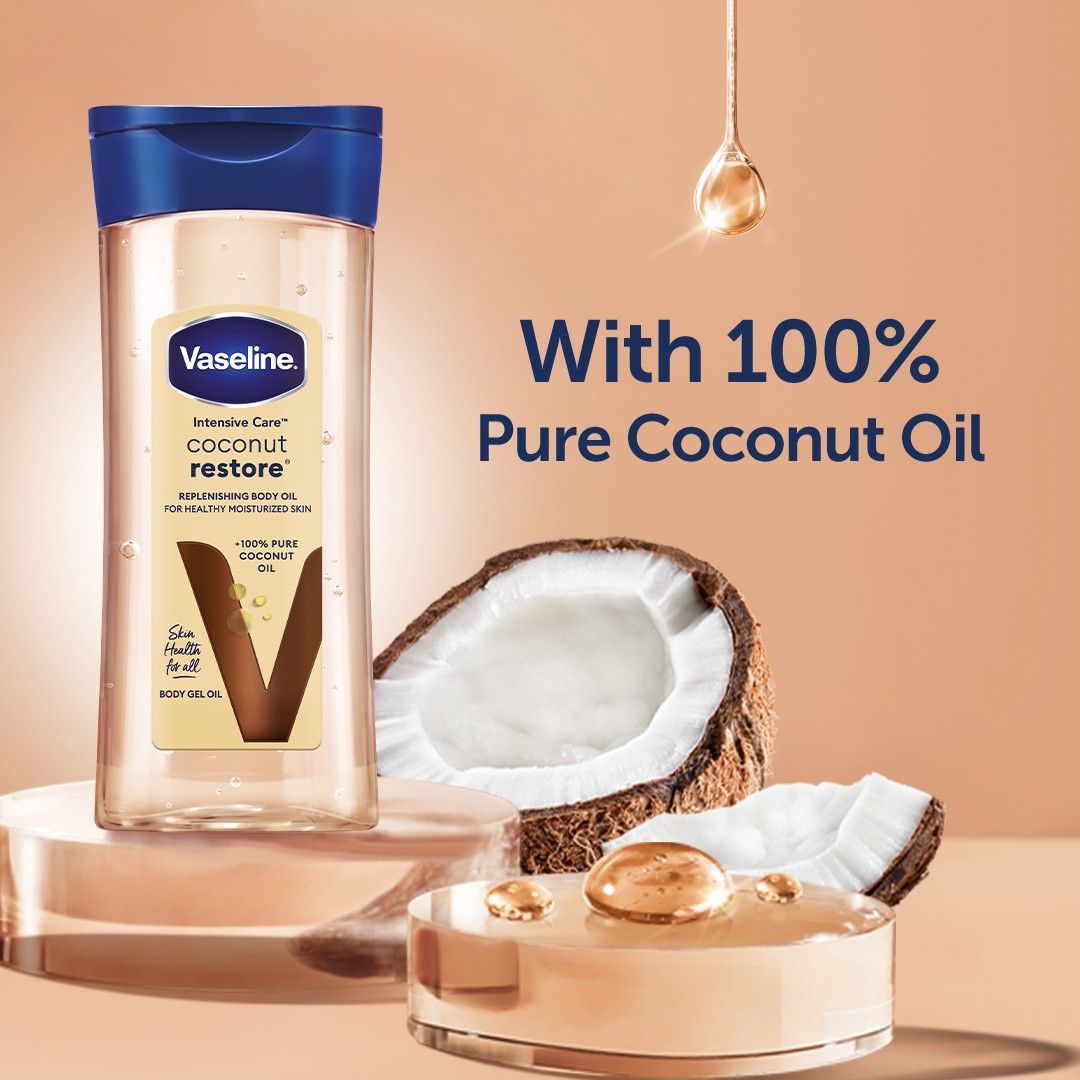 Huile corporelle Vaseline Intensive Care Coconut Restore pour une peau saine et hydratée. Gel-huile corporel régénérant à base d'huile de noix de coco 100 % pure,