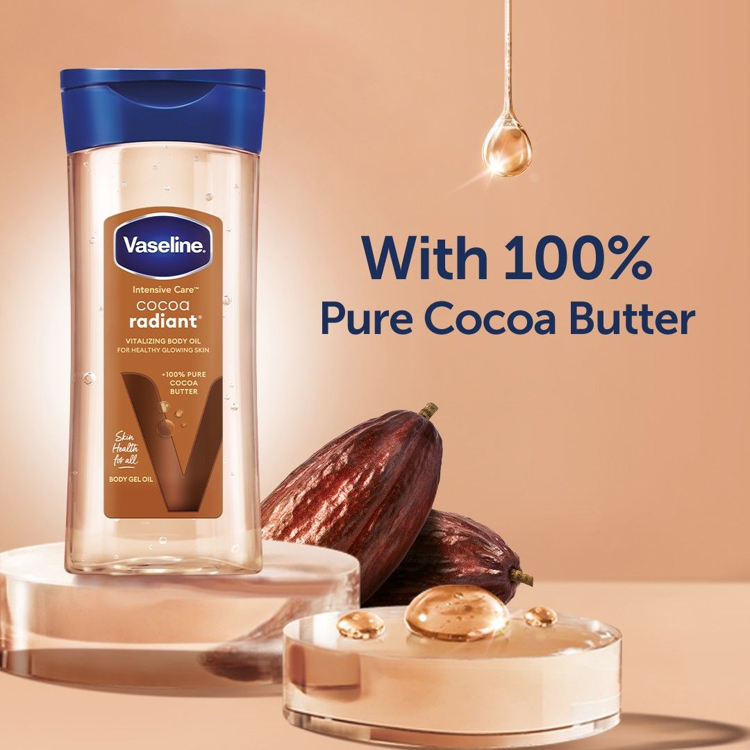 Vaseline Intensive Care Cocoa Radiant pour une peau éclatante, huile corporelle au beurre de cacao pur + huiles régénérantes,