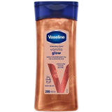 Vaseline Intensive Care Vanilla Glow Sunlit Shimmer, Entspannendes Körperöl mit reiner Kakaobutter, Vanille und Glitzer,